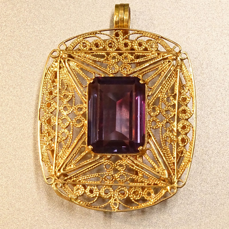 Vintage Emerald Cut Amethyst and 14 Karat Yellow Gold Filigree Pendant Brooch.