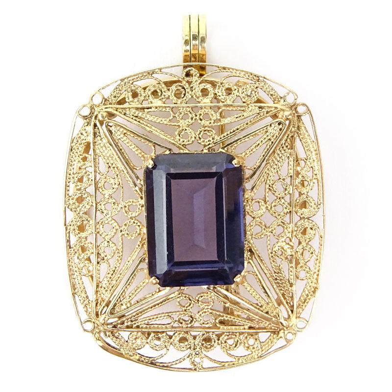 Vintage Emerald Cut Amethyst and 14 Karat Yellow Gold Filigree Pendant Brooch.