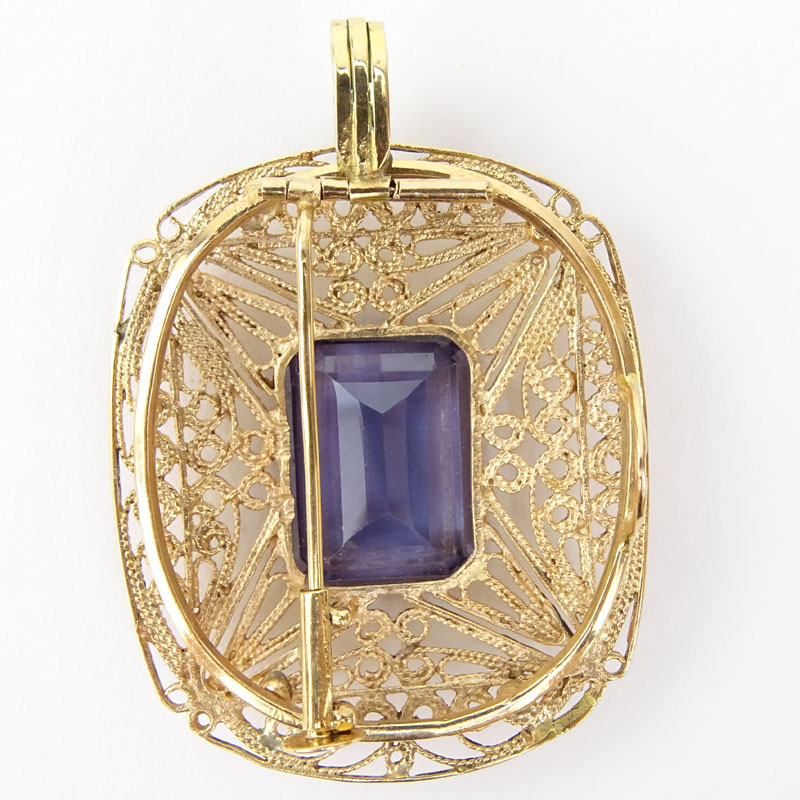 Vintage Emerald Cut Amethyst and 14 Karat Yellow Gold Filigree Pendant Brooch.