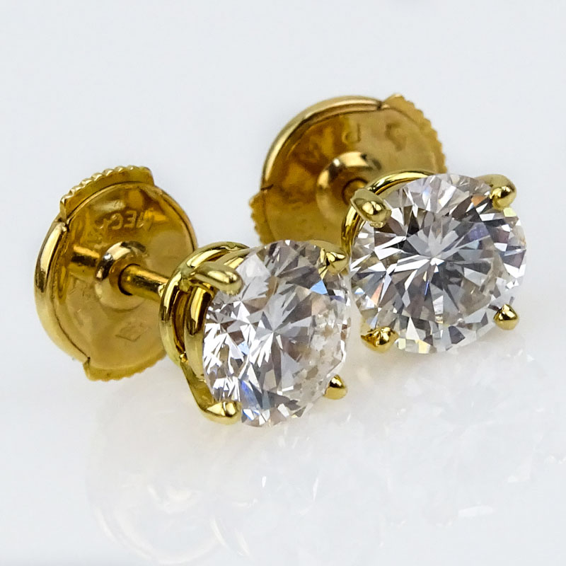 Vintage Cartier Paris GIA Certified 2.12 Carat Round Brilliant Cut Diamond and 18 Karat Yellow Gold Ear Studs.