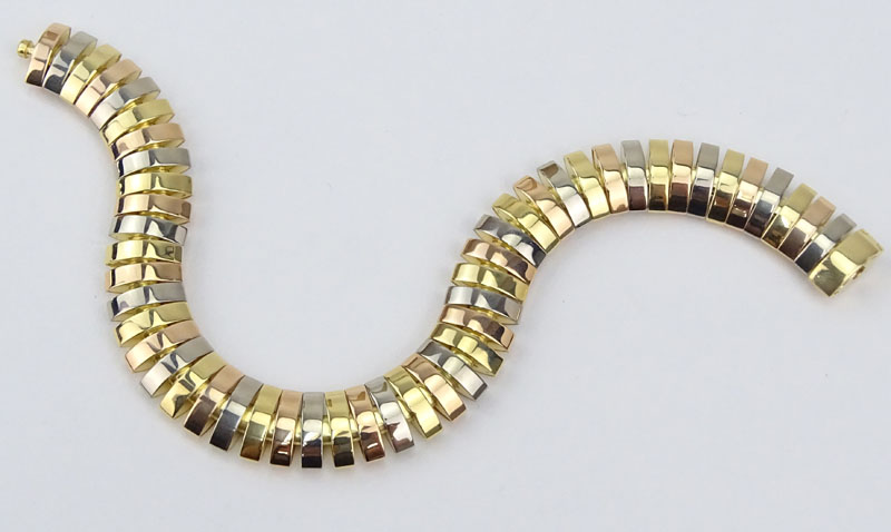 Cartier Tubogas Tri-Color 18 Karat Gold Flex Link Bracelet.