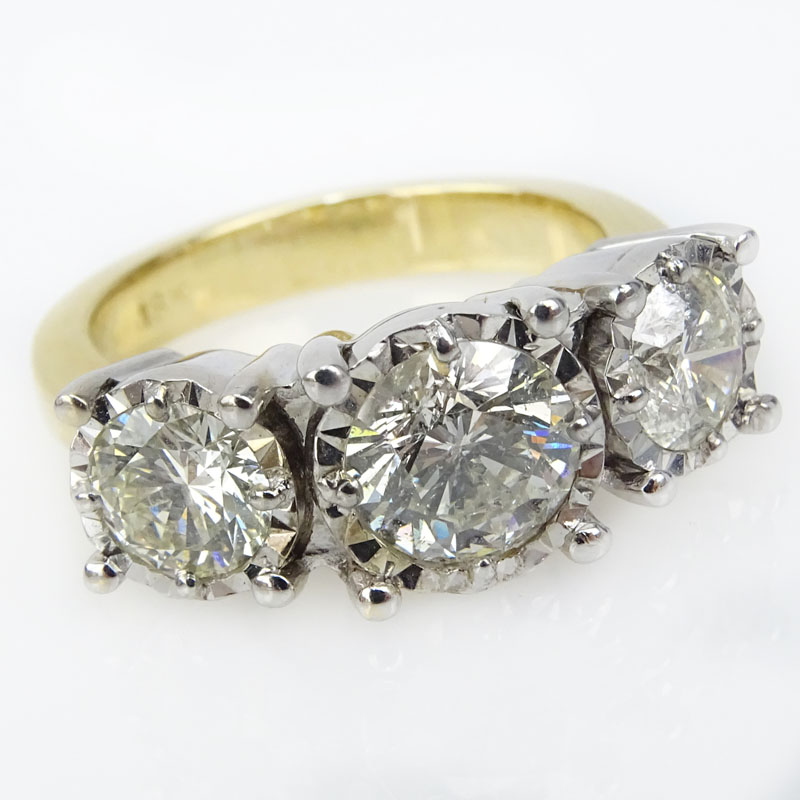 Vintage Approx. 3.75 Carat Round Brilliant Cut Diamond and 18 Karat Yellow and White Gold Three Stone Ring.