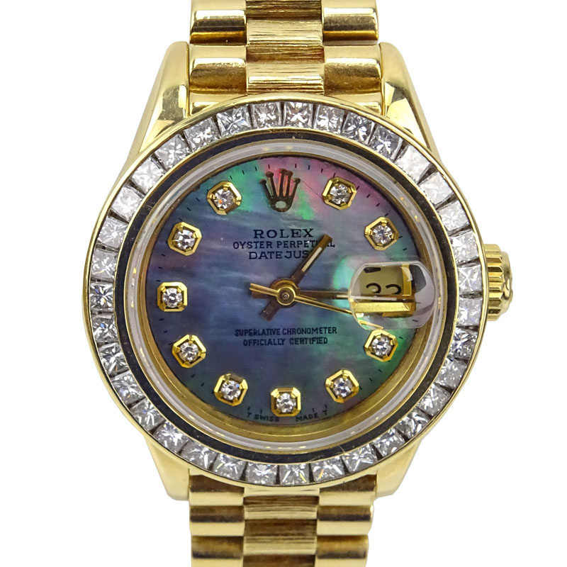 Lady's Rolex 18 Karat Yellow Gold Date Just Bracelet Watch.