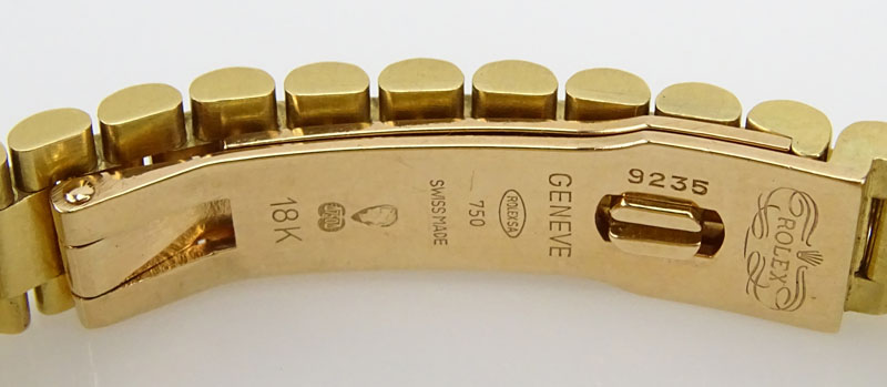 Lady's Rolex 18 Karat Yellow Gold Date Just Bracelet Watch.