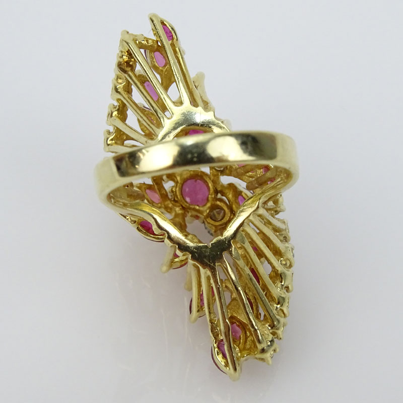 Vintage Marquise and Round Brilliant Cut Ruby, Round Brilliant Cut Diamond and 14 Karat Yellow Gold Cluster Ring.