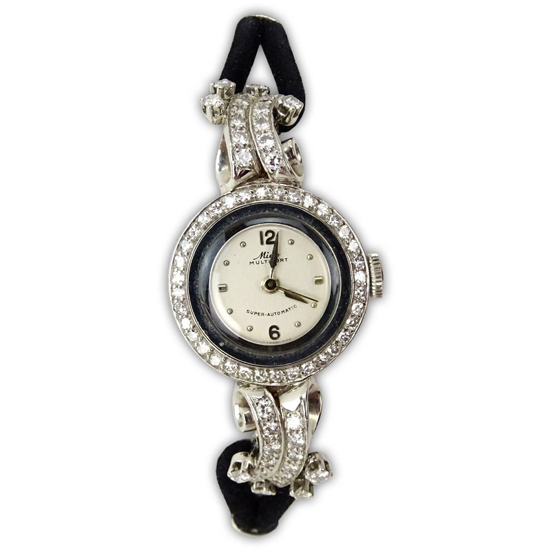 Lady's Vintage Diamond and Platinum Mido Multifort Super-Automatic Movement Watch.