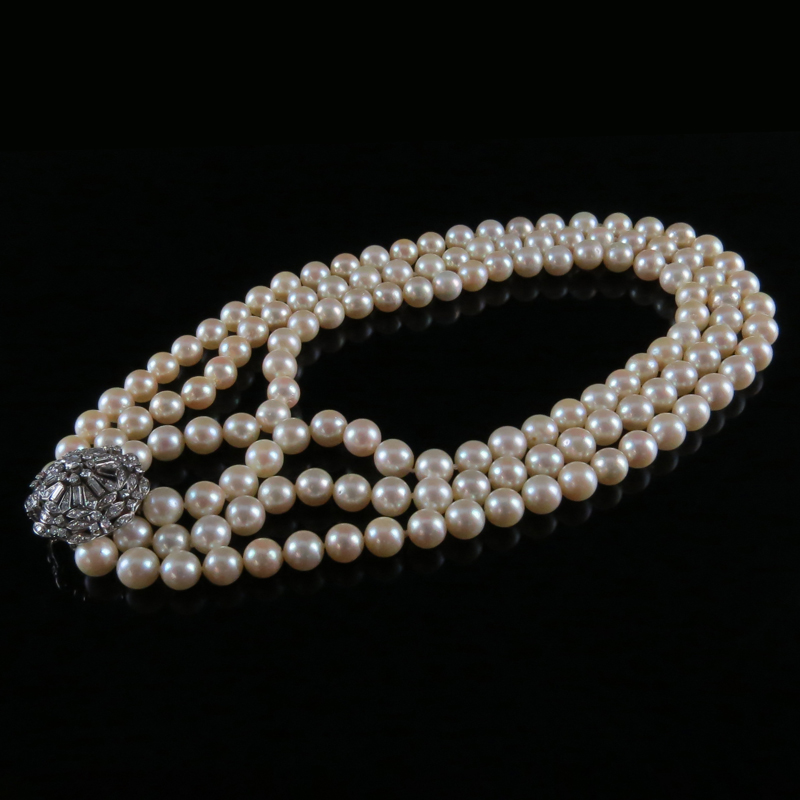 Lady's Vintage Three Strand Pearl Necklace with Diamond and Karat 18 Karat White Gold Clasp.