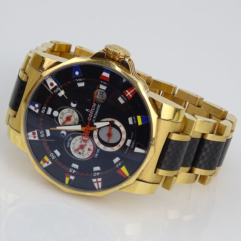 Man's Corum 18 Karat Yellow Gold and Carbon Fibre Admiral's Cup Bracelet Watch.