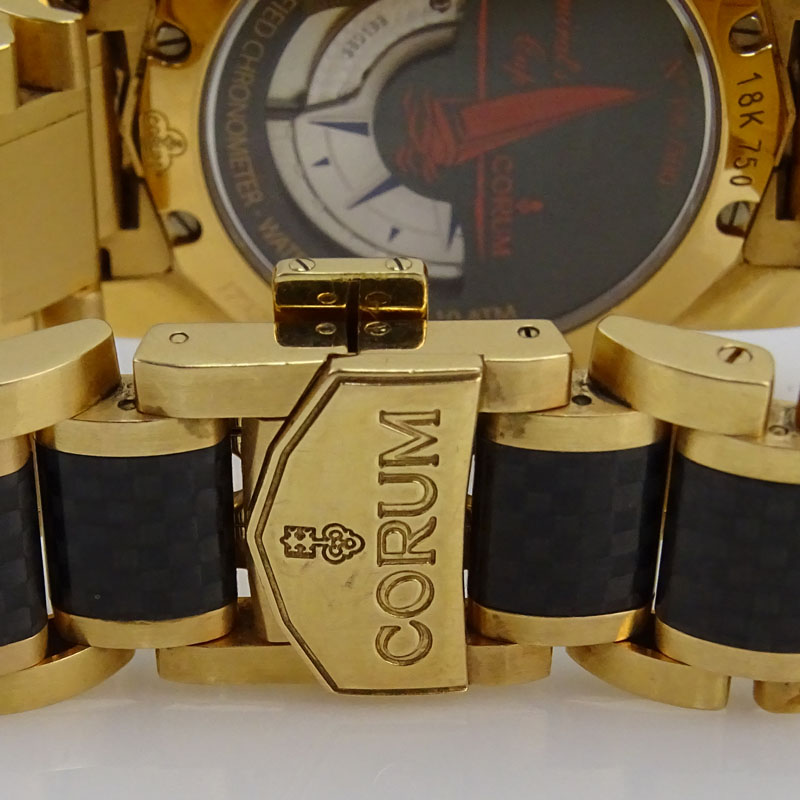 Man's Corum 18 Karat Yellow Gold and Carbon Fibre Admiral's Cup Bracelet Watch.