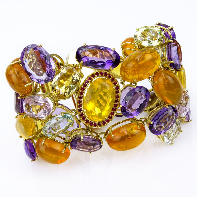 Estate Approx. 285.0 Carat Opal, Aquamarine, Kunzite, Ruby, Amethyst, Citrine and 18 Karat Yellow Gold Wide Bracelet. 