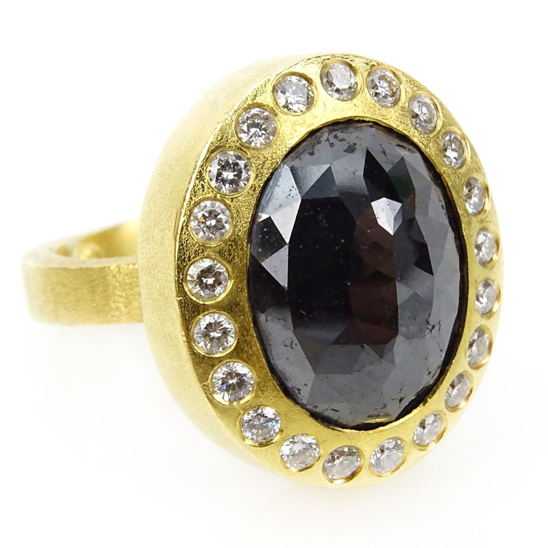 Approx. 10.0 Carat Oval Cut Black Diamond and 18 Karat Yellow Gold Ring with Diamond Bezel.