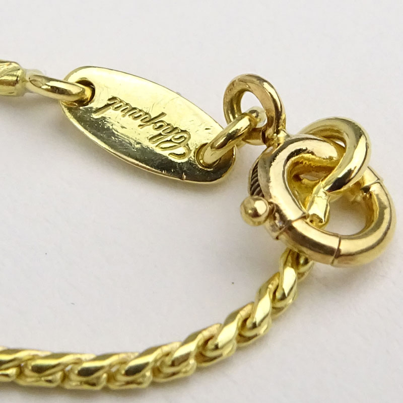 Vintage Chopard Happy Diamond and 18 Karat Yellow Gold Multi Hearts Charm Necklace.