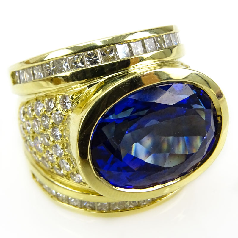 Approx. 13.50 Carat Oval Cut Tanzanite, 2.60 Carat Diamond and 18 Karat Yellow Gold Ring. 