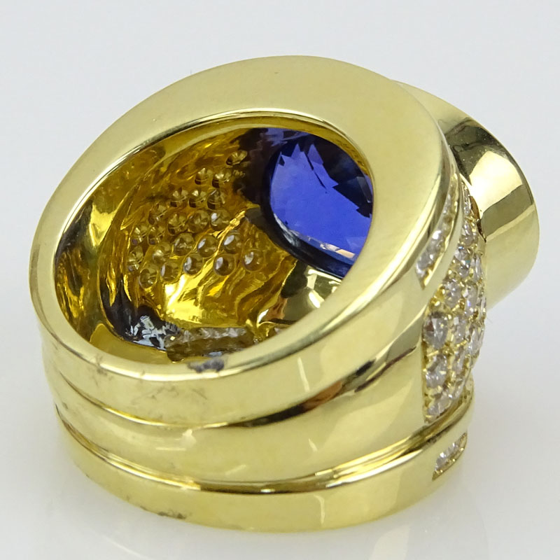 Approx. 13.50 Carat Oval Cut Tanzanite, 2.60 Carat Diamond and 18 Karat Yellow Gold Ring. 