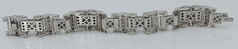 Approx. 18.0 Carat Round Brilliant and Baguette Cut Diamond and 18 Karat White Gold Link Bracelet.