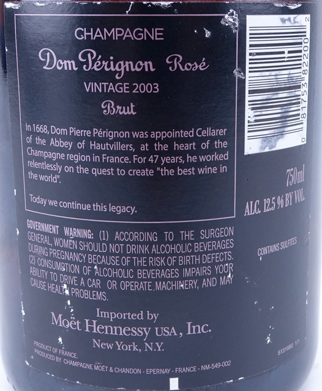 Vintage 2003 Dom Pérignon Rosé Champagne Bottle with Luminous Label. In unopened condition.