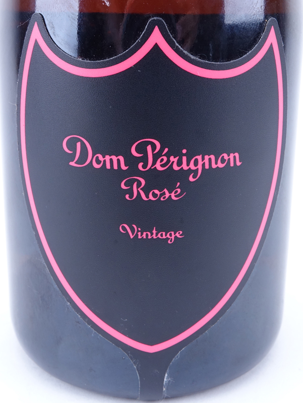 Vintage 2003 Dom Pérignon Rosé Champagne Bottle with Luminous Label. In unopened condition.