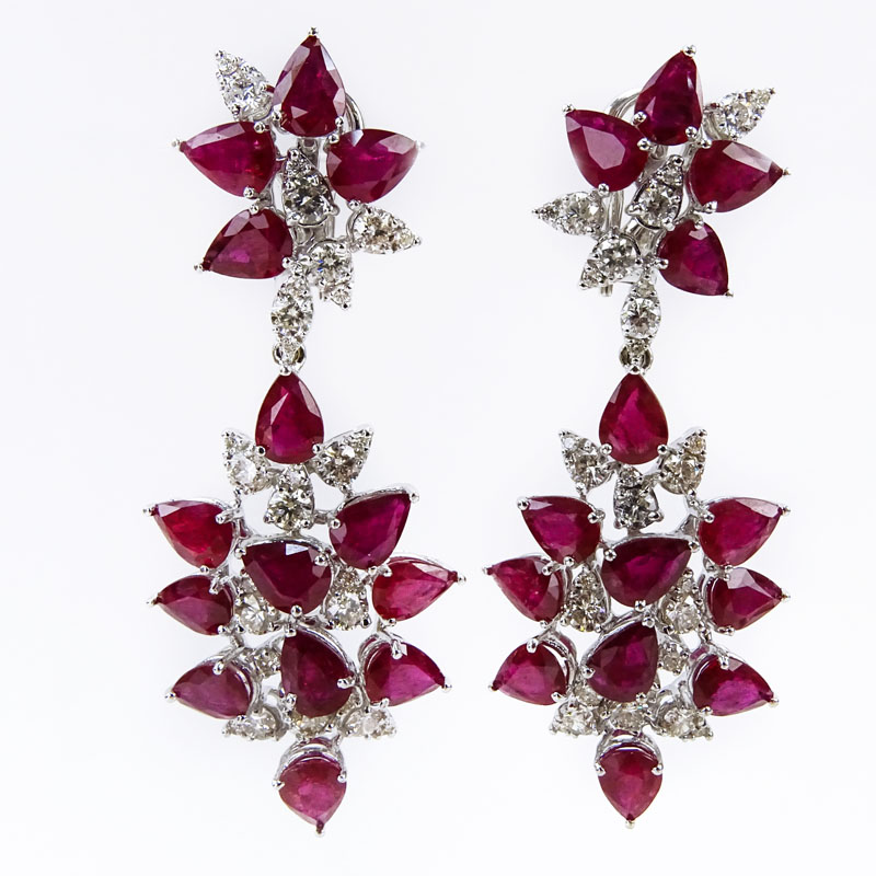 Van Cleef & Arpels style Approx. 22.0 Carat Pear Shape Burma Ruby, 4.0 Carat Pear Shape Diamond and 18 Karat White Gold Chandelier Earrings. 