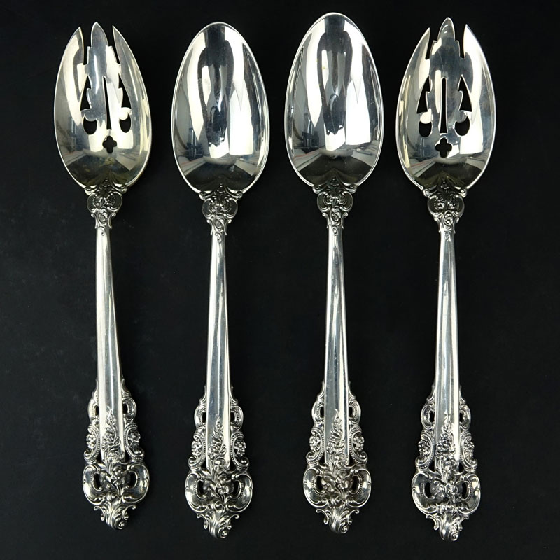 Collection of Four (4)  Wallace "Grand Baroque" Sterling Silver Serving Spoons.