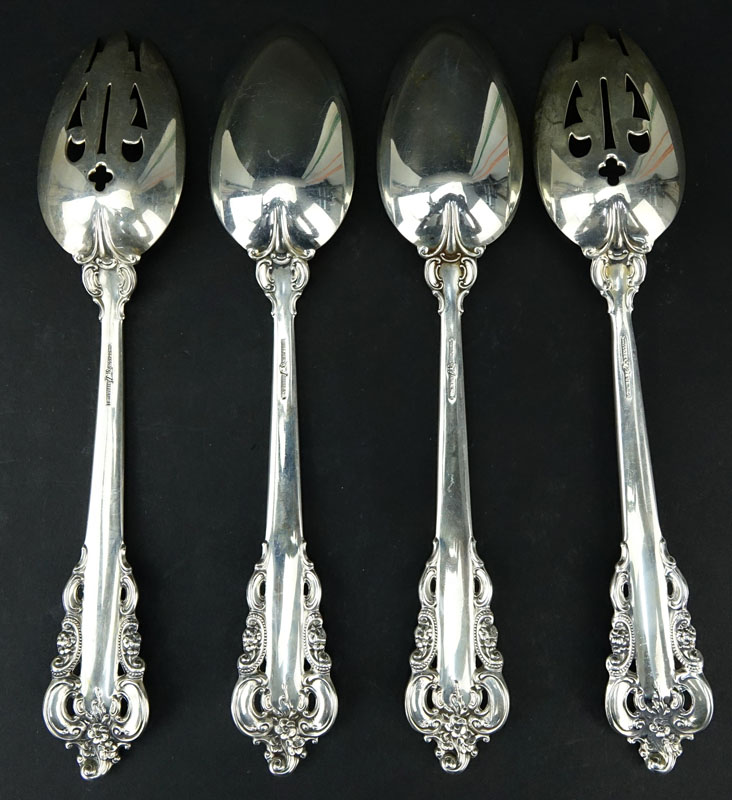 Collection of Four (4)  Wallace "Grand Baroque" Sterling Silver Serving Spoons.