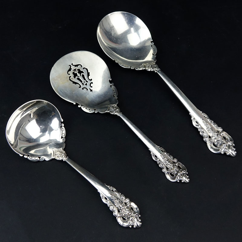 Collection of Three (3) Wallace "Grand Baroque" Sterling Silver Serving Spoons. 