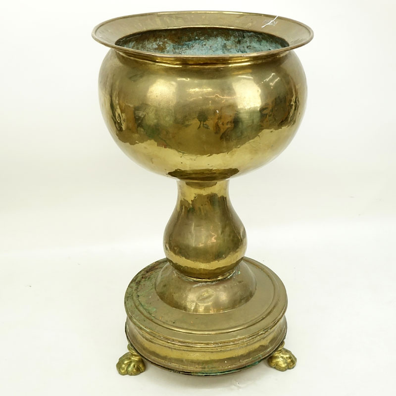 Large Brass Jardinière with Paw Feet. Has a few dings and dents, needs cleaning. 