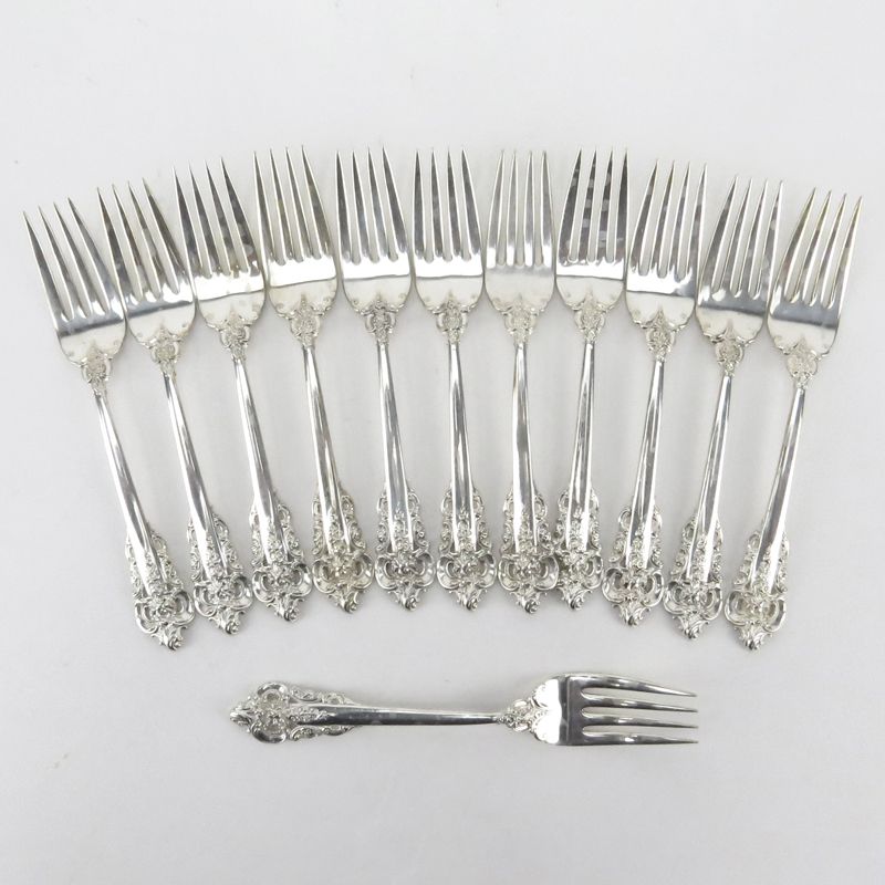 Set of Twelve (12) Wallace "Grand Baroque" Sterling Silver Salad Forks. 