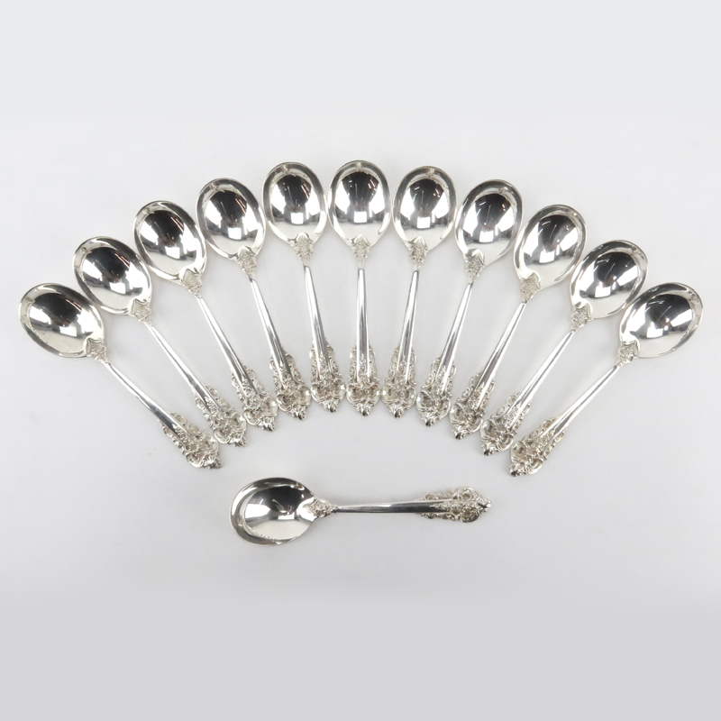 Set of Twelve (12) Wallace "Grand Baroque" Sterling Silver Round Bowl Soup Spoons. 