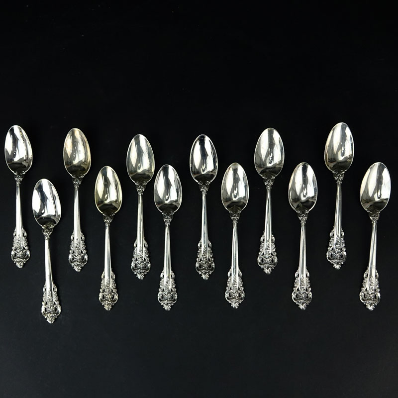 Set of Twelve (12) Wallace "Grand Baroque" Sterling Silver Teaspoons. Circa 1941. 