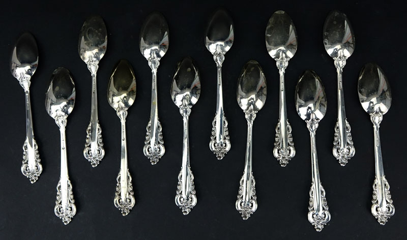 Set of Twelve (12) Wallace "Grand Baroque" Sterling Silver Teaspoons. Circa 1941. 