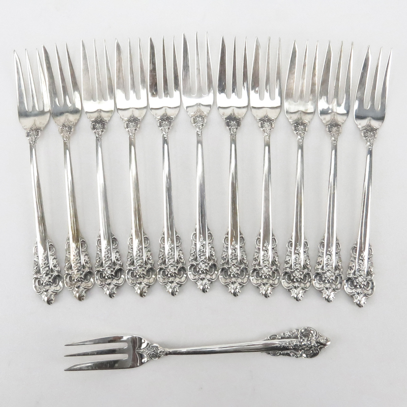 Set of Twelve (12) Wallace "Grand Baroque" Sterling Silver Cake Forks. 