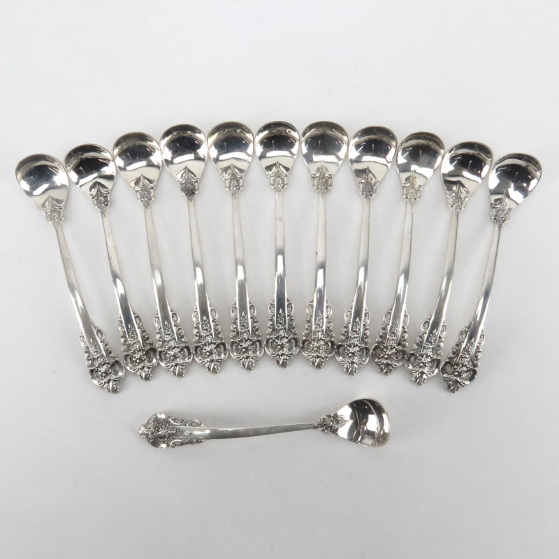 Set of Twelve (12) Wallace "Grand Baroque" Sterling Silver Mustard Spoons. 