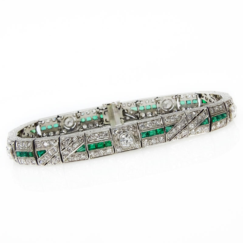 Circa 1920s Art Deco Approx. 5.50 Carat Diamond, 2.0 Carat Emerald and Platinum Bracelet. 