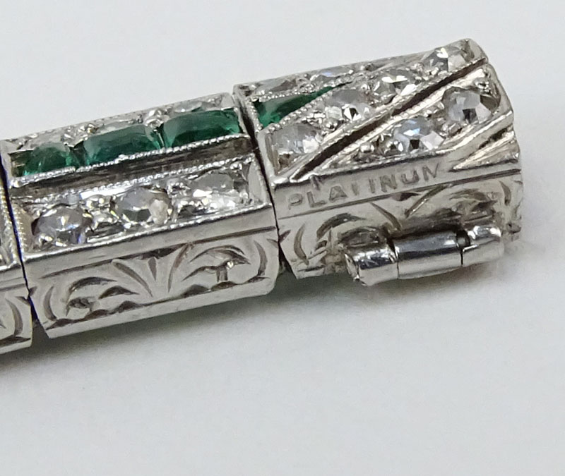 Circa 1920s Art Deco Approx. 5.50 Carat Diamond, 2.0 Carat Emerald and Platinum Bracelet. 