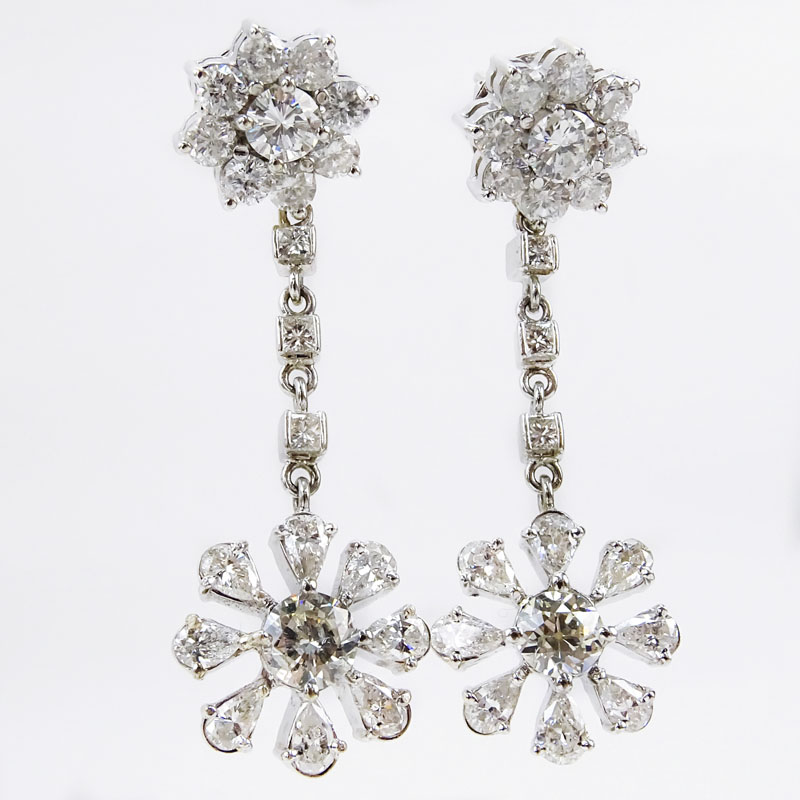 Approx. 7.0 Carat Round Brilliant, Pear and Princess Cut Diamond and 14 Karat White Gold Chandelier Earrings. 