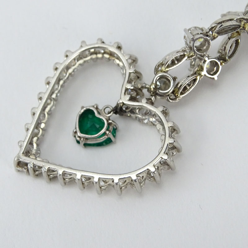 Vintage Approx. 10.50 Carat Round Brilliant and Marquise Cut Diamond and Heart Shape Emerald Heart Pendant Necklace.