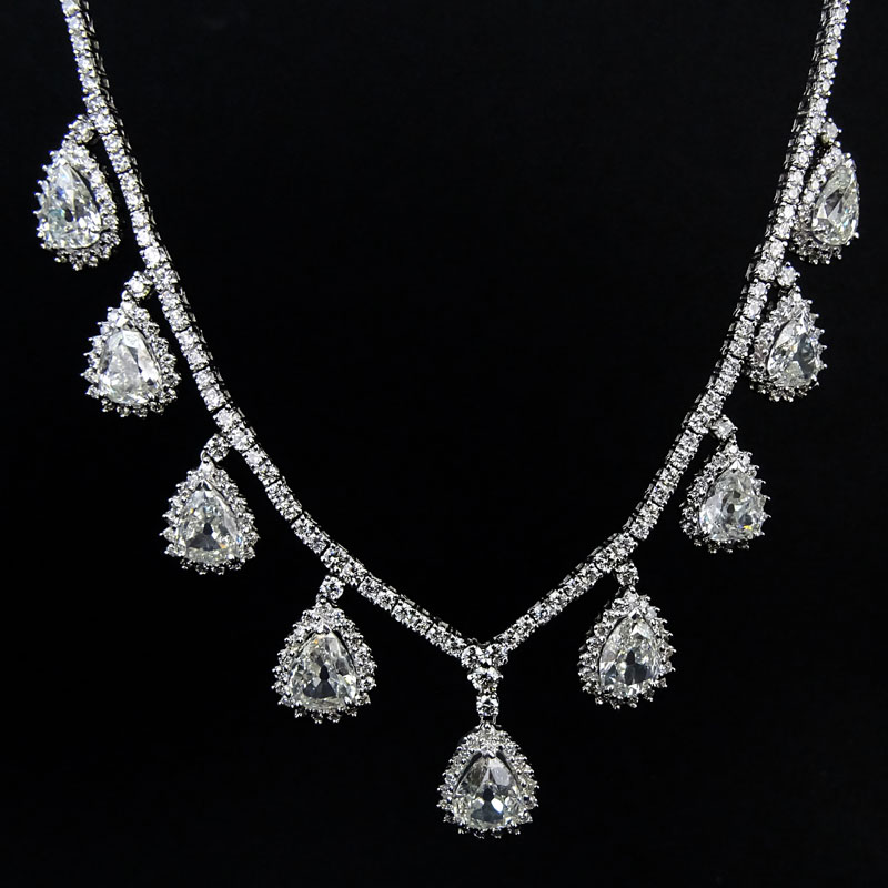 16.0 Carat Diamond and 18 Karat White Gold Necklace set with Nine (9) Pear Shape Diamonds weighing  9.81 Carats and 6.19 Carat Round Brilliant Cut Diamonds.