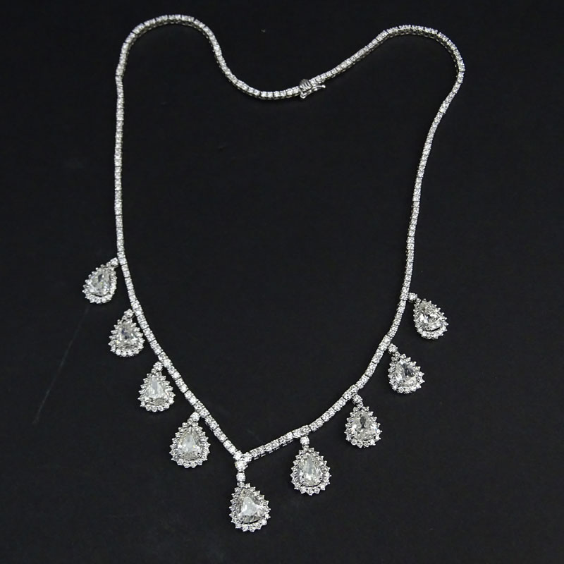 16.0 Carat Diamond and 18 Karat White Gold Necklace set with Nine (9) Pear Shape Diamonds weighing  9.81 Carats and 6.19 Carat Round Brilliant Cut Diamonds.