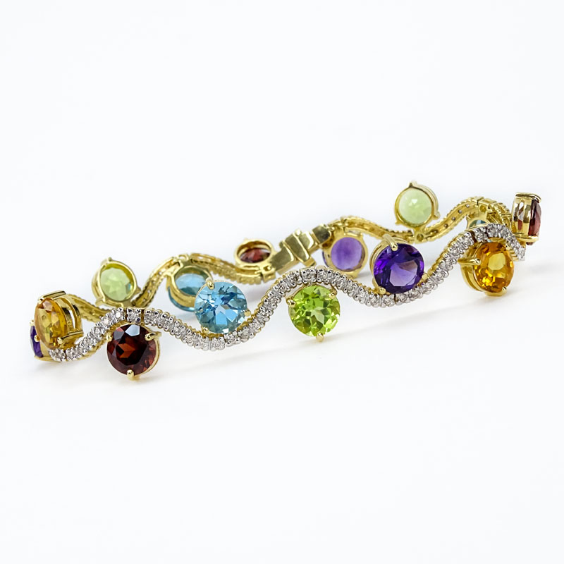 Vintage Approx. 19.50 Carat Multi Stone, Diamond and 18 Karat Yellow Gold Bracelet, Set with Amethysts, Topaz, Peridot and Citrine. 