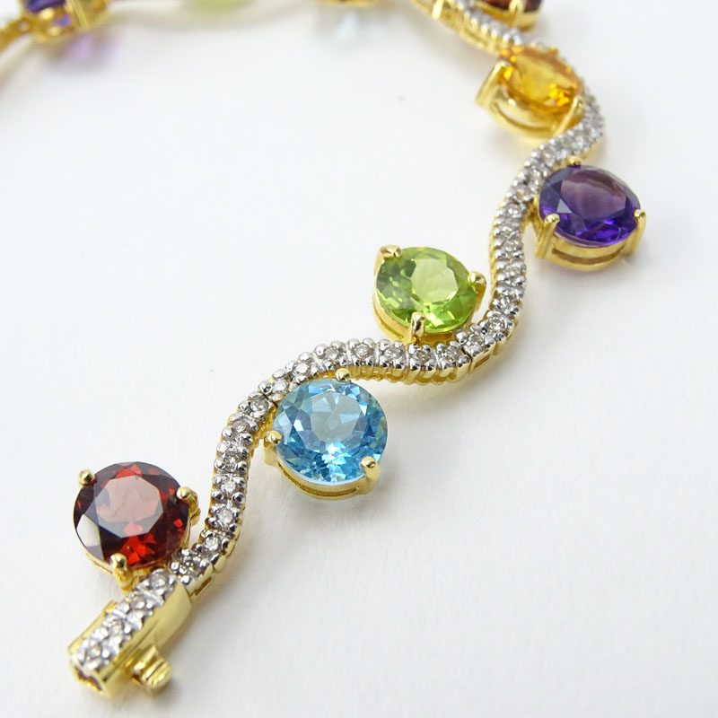 Vintage Approx. 19.50 Carat Multi Stone, Diamond and 18 Karat Yellow Gold Bracelet, Set with Amethysts, Topaz, Peridot and Citrine. 