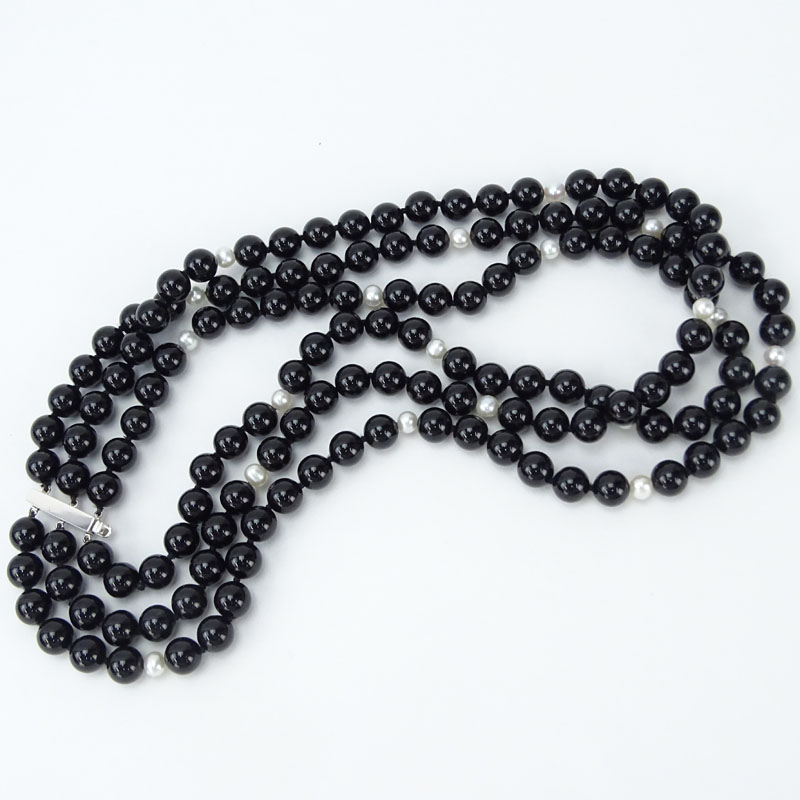 Vintage Black Onyx, Pearl and 18 Karat White Gold Three Strand Necklace. 