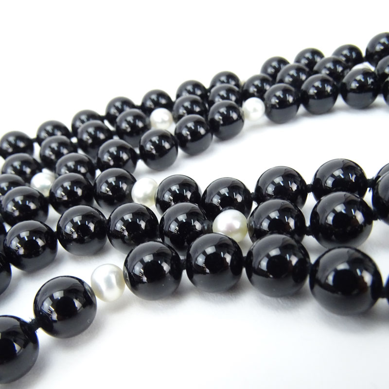 Vintage Black Onyx, Pearl and 18 Karat White Gold Three Strand Necklace. 