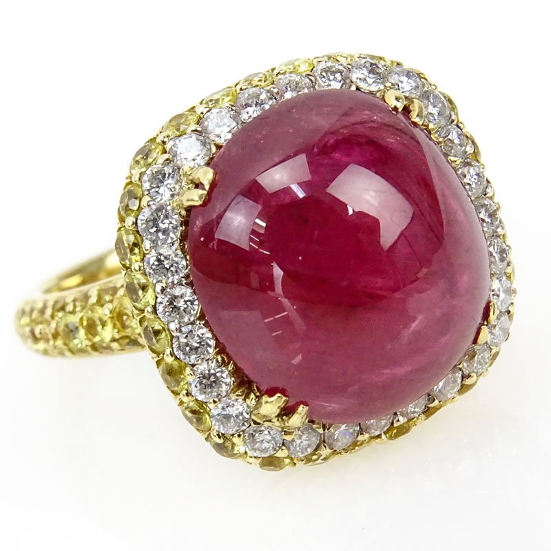 Approx. 11.50 Carat Cabochon Burma Ruby, 2.03 Carat Diamond and 14 Karat Yellow Gold Ring. 