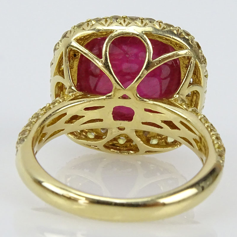 Approx. 11.50 Carat Cabochon Burma Ruby, 2.03 Carat Diamond and 14 Karat Yellow Gold Ring. 