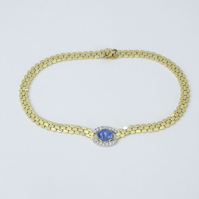 Vintage Approx. 14.25 Carat Cabochon Sapphire, .76 Carat Round Brilliant Cut Diamond and 14 Karat yellow Gold Necklace. 