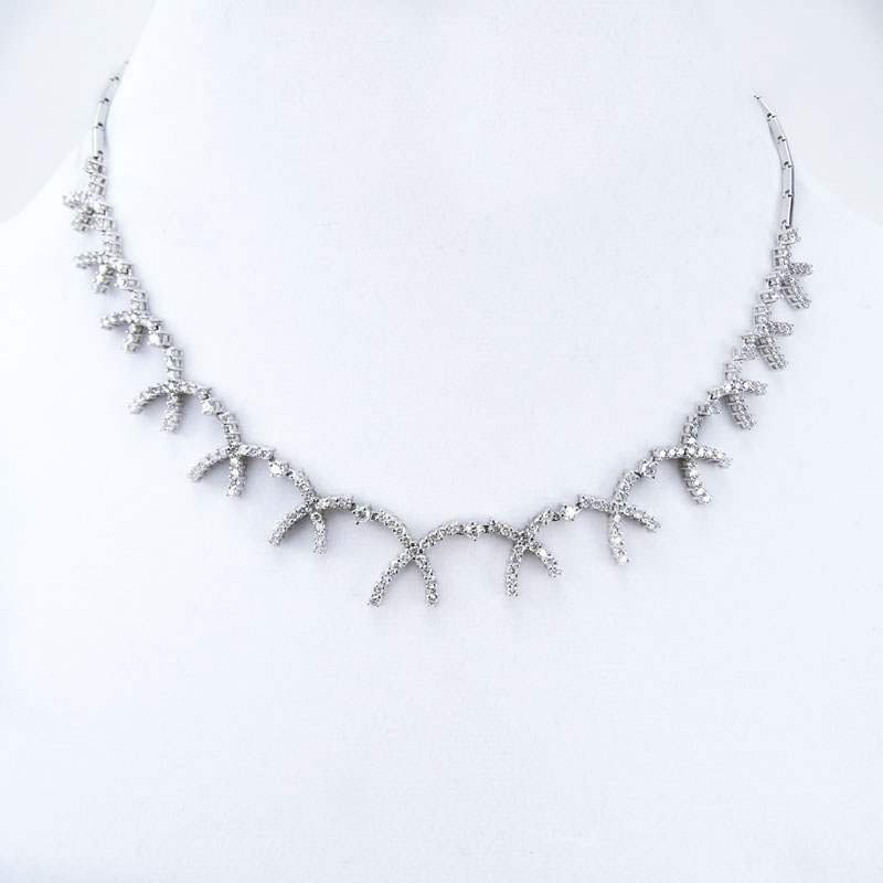 Approx. 6.45 Carat Round Brilliant Cut Diamond and 14 Karat White Gold "X" Necklace. 