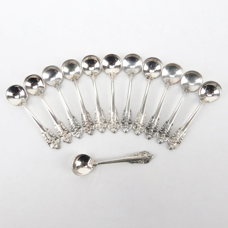 Set of Twelve (12) Wallace "Grand Baroque" Sterling Silver Salt Spoons. 