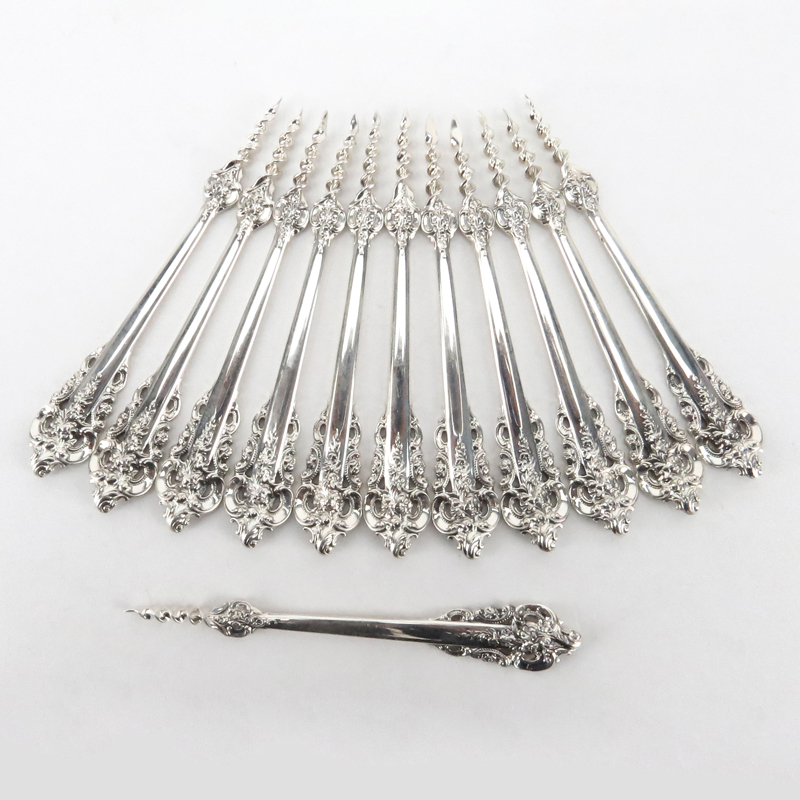 Set of Twelve (12) Wallace "Grand Baroque" Sterling Silver One Tine Butter Picks. 