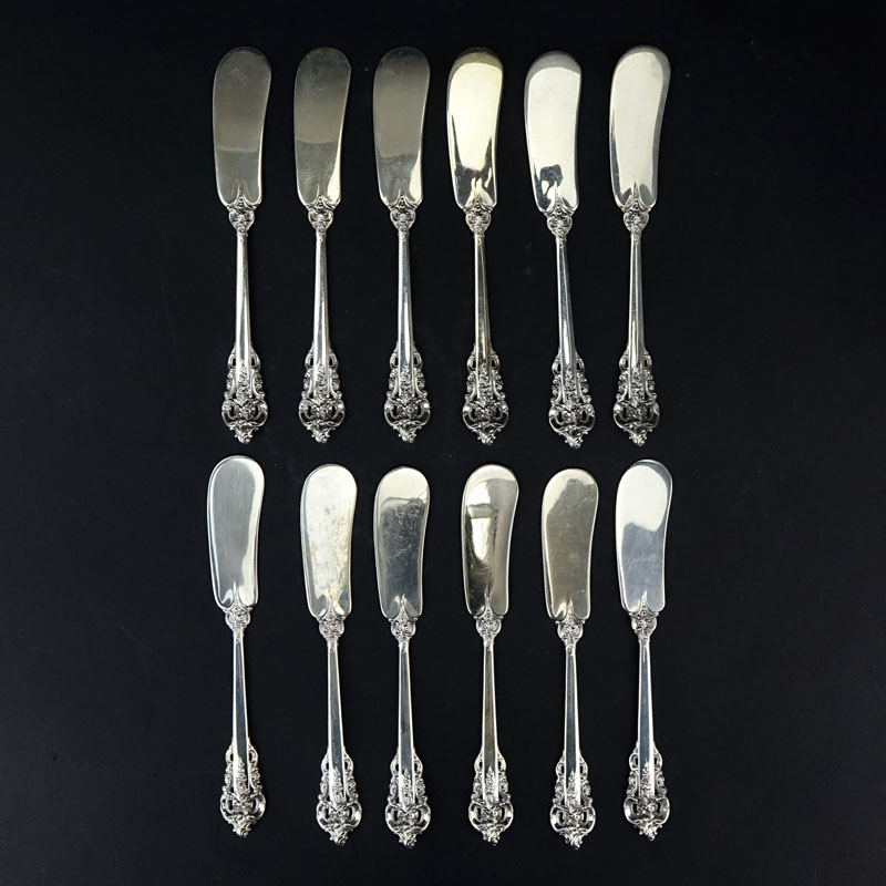 Set of Twelve (12) Wallace "Grand Baroque" Sterling Silver Butter Spreaders. 