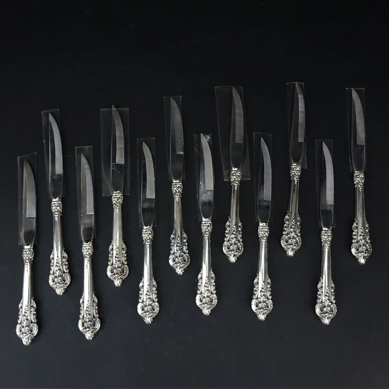 Set of Twelve (12) Wallace "Grand Baroque" Sterling Silver Handled Beveled Steak Knives.